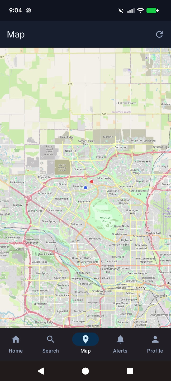 The Lost & Found Android app's Map tab: a full-screen OpenStreetMap basemap with case markers and the app's bottom navigation bar for Home, Search, Map, Alerts and Profile.